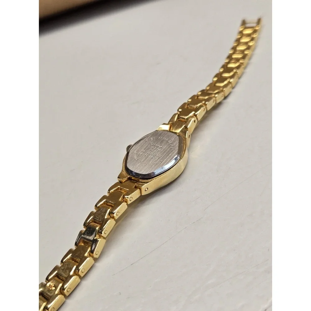 Embassy Womens Watch Gold Tone Rhinestone Bezel Small Chevron Link Bracelet